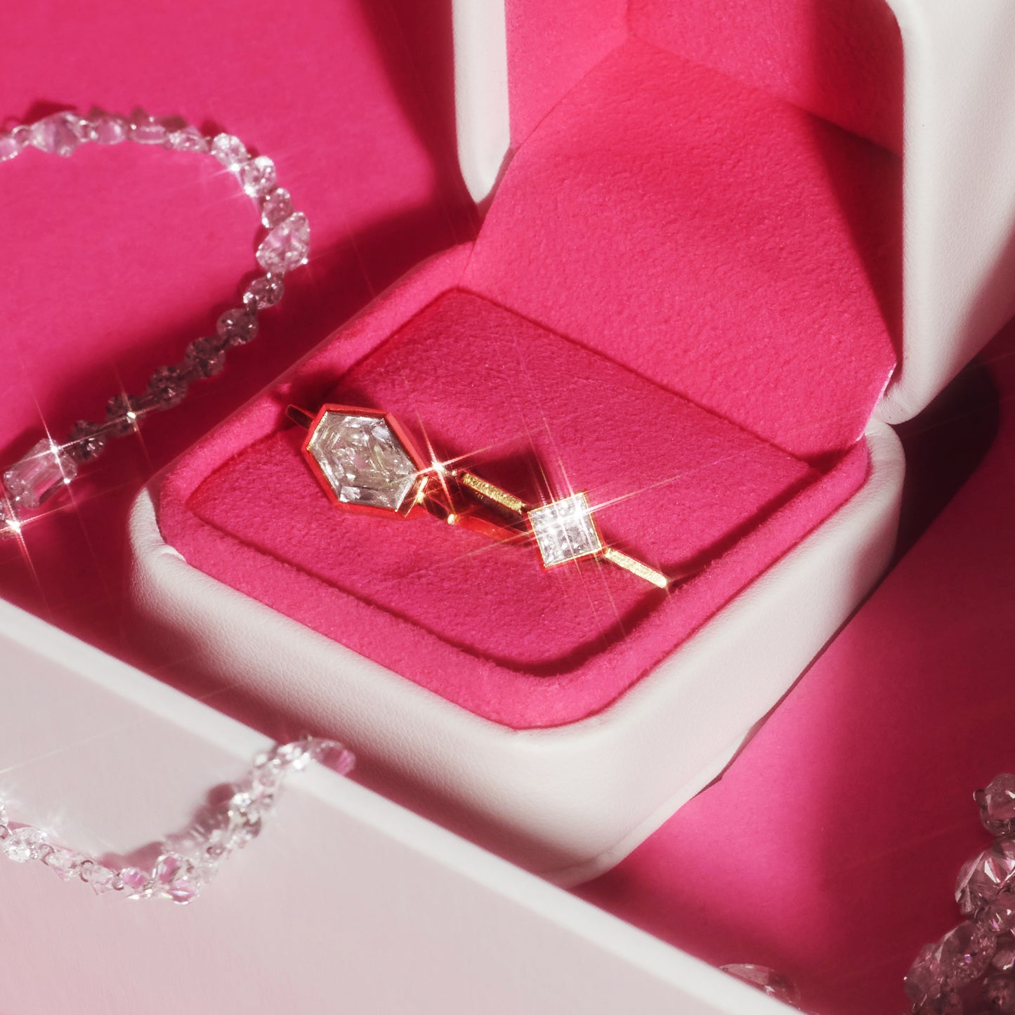 Highline ring with a princess-cut lab-grown diamond in 18ct yellow gold, displayed in a pink ring box.