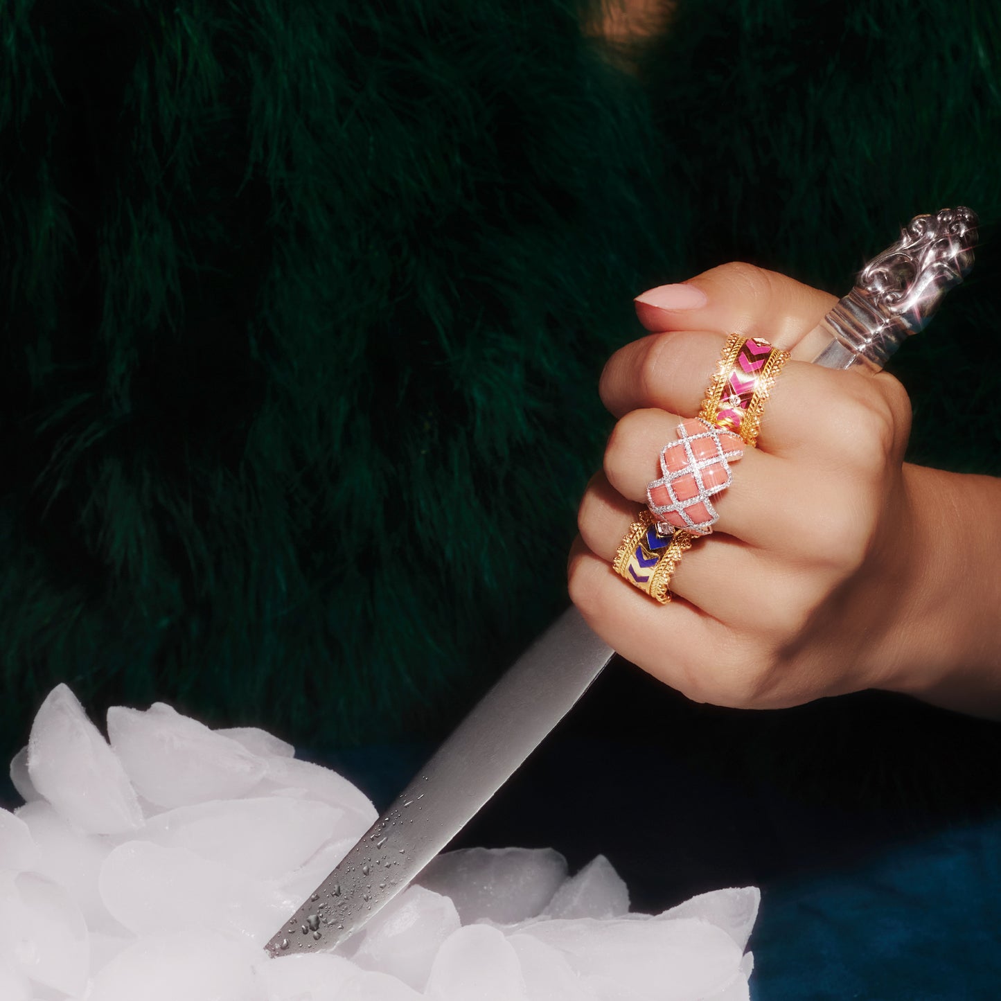 Venezia ring in 18ct yellow gold with navy enamel and lab-grown diamonds, worn on a hand.